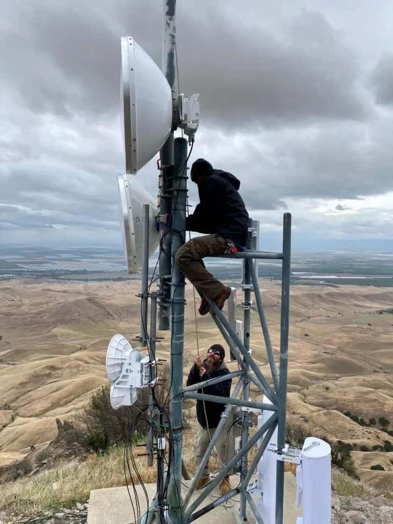 Succeed.Net technician on a tower